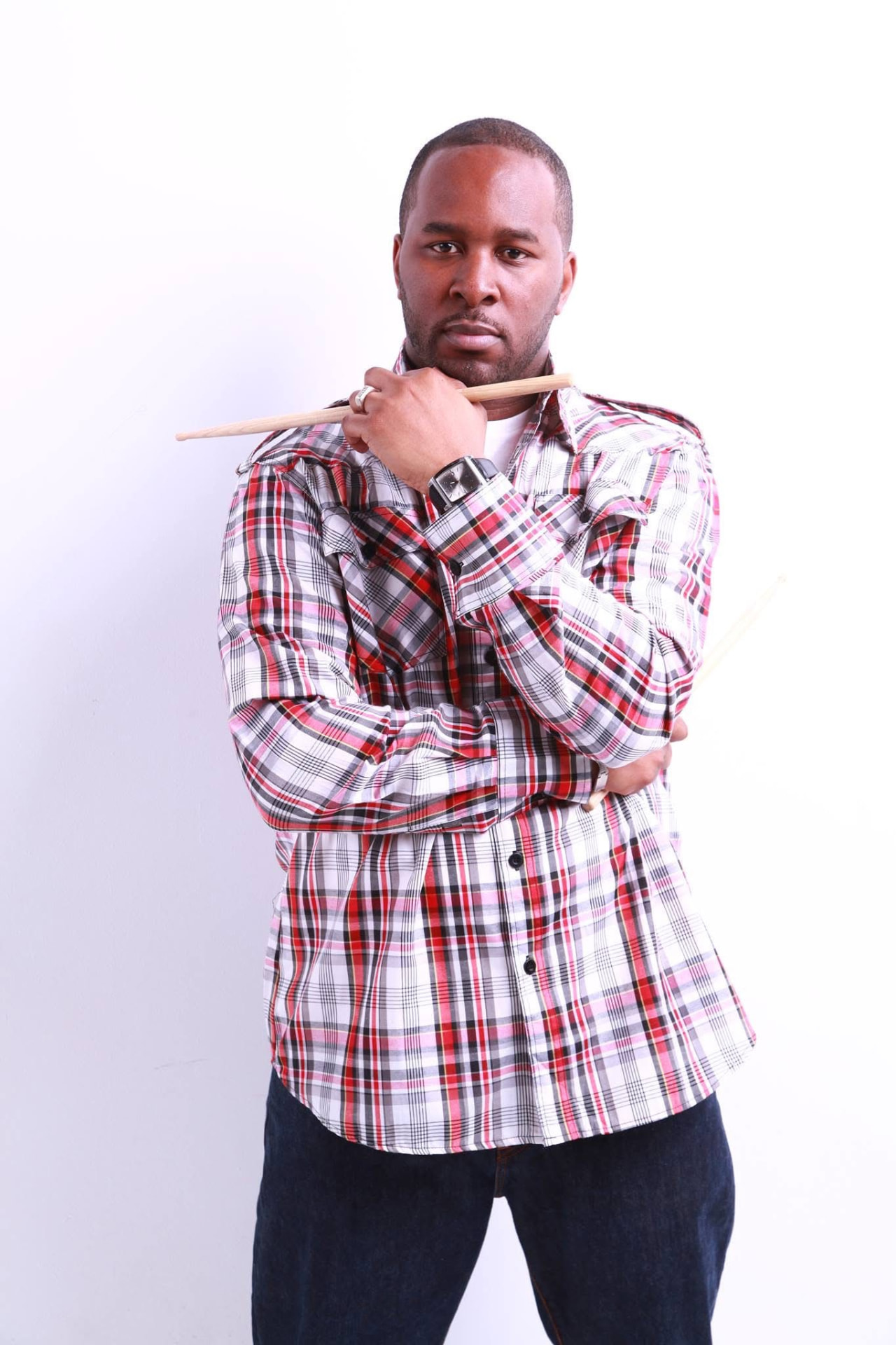 Travien Bryson holding drumsticks